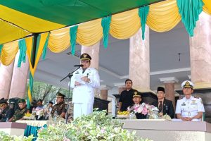 Pj Bupati Parimo Sampaikan Amanat Mendagri Saat Upacara Peringatan Hari Otonomi Daerah Ke-XXVII